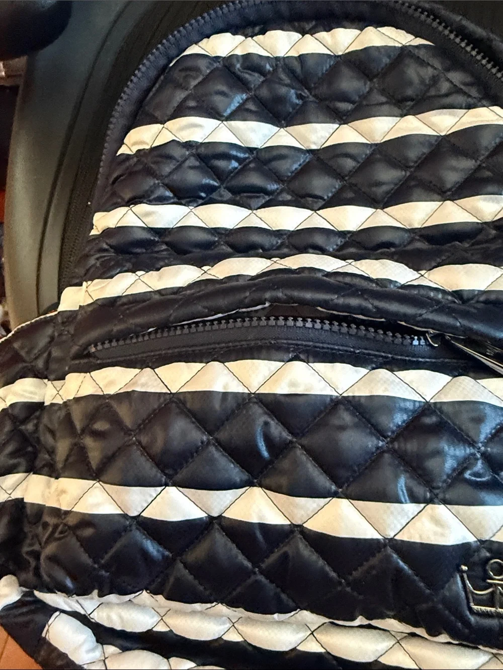 ⁠OLIVER THOMAS Quilted Backpack Black White Stripe Red Lining Washable